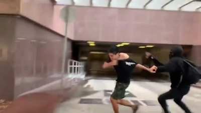 At the Wi Spa protest in Los Angeles, a lone young man gets his sign ripped up by an antifa. A mob of antifa then assaults him to the ground &amp;amp; kicks him after he got out pepper spray.