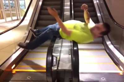 WCGW playing on an escalator.