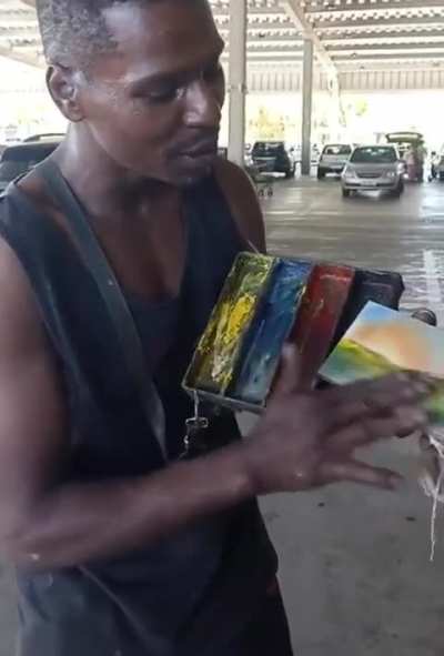 Skilled Man Creates A Painting With Just His Hand