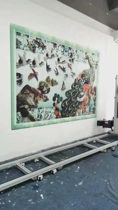 This wall-printer that can put a painting right onto your wall....