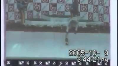 A fan records R&auml;ikk&ouml;nen's bottle drop from the big screen.