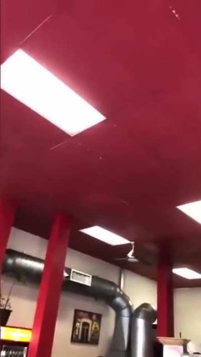 Lady falls through ceiling at a restaurant.