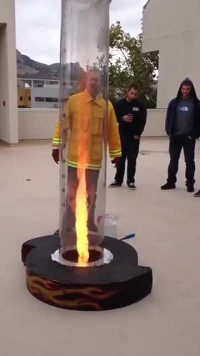 A Fire Instructor demonstrates the "Chimney Effect" to his trainees