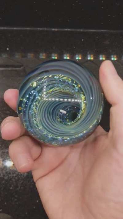 Handheld Black hole by Jackson Ocheltree