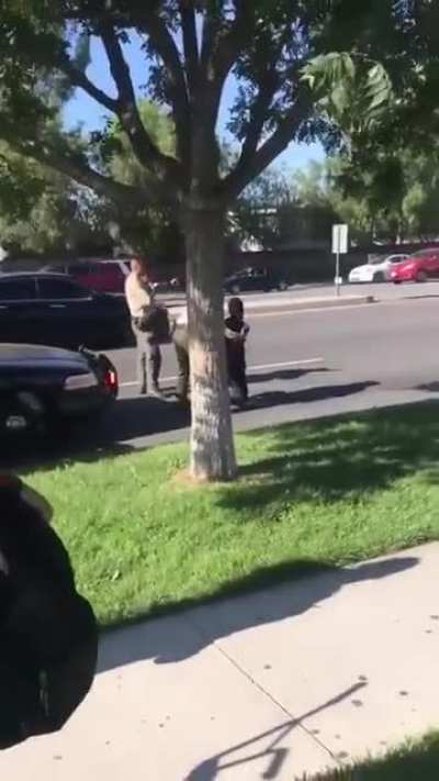 This is how police respond when black teens are threatened by a homeless assailant