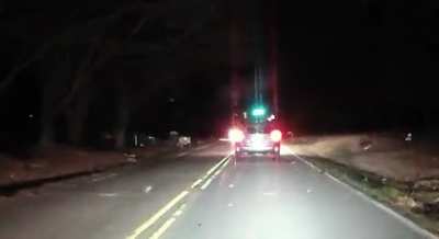 Car Hits Deer, sends him spinning.