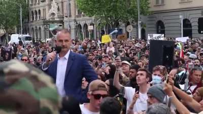 Former police officer delivers a powerful message to his old colleagues at a protest in Melbourne, Australia. "The world is watching, and they're watching for good reason. They're watching, because what's happening here is absolutely ridiculous!"