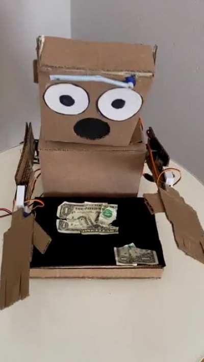 That Cardboard Robot Magician is back... with 💸😱⁉️ by mariothemagician