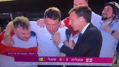 England football fan chants "FREE PALESTINE" in Israeli TV interview following win over Senegal.
