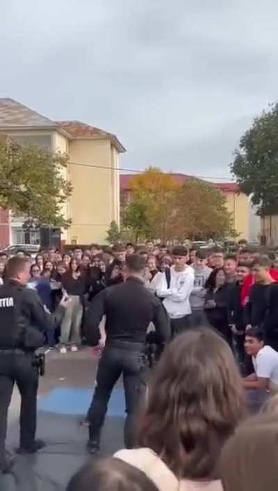 Cops Try To Demonstrate CQC And Get Their Butts Kicked