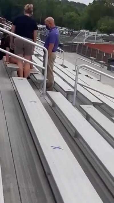 Anti-mask woman resists arrest then is tazed at high school football game.