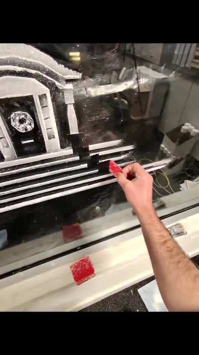 the art of covering the showcase glass with snow like therapy