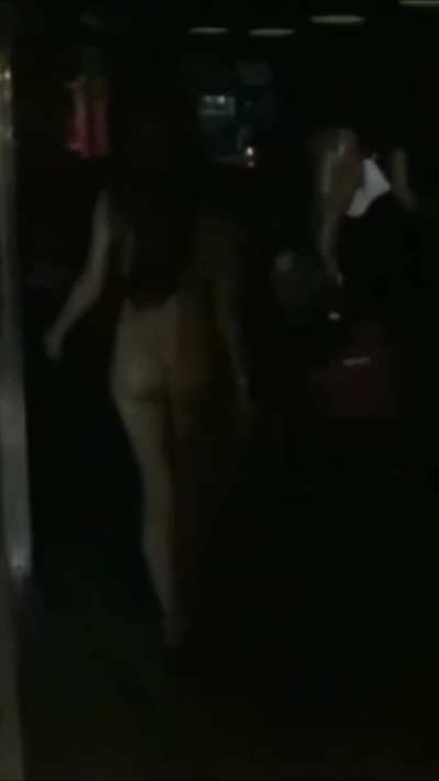 Naked beauties danced in front of a nightclub, and then they had a naked disco in the club