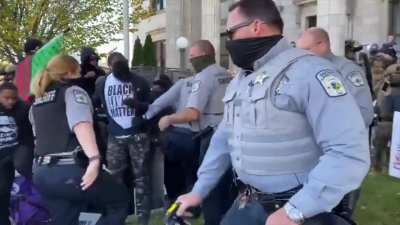 In North Carolina, Alamance county polls ends with police using pepper-spray on voters, protesters and children alike