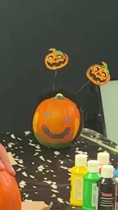 Eagles painting pumpkins