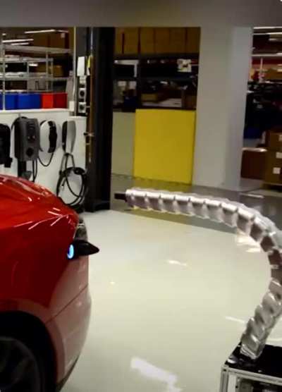 Концепт автоматического зарядного устройства "змейки" от Tesla