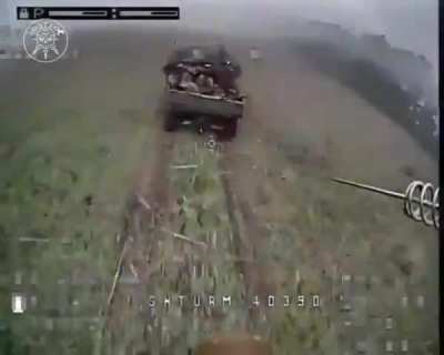 A Chinese DesertCross 1000-3 transferring Russian soldiers to the frontline is getting attacked by a Ukrainian FPV quad. A Russian soldier throws his assault rifle at the drone trying to stop it.