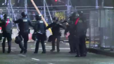 Protestor eludes the police in Portland last night