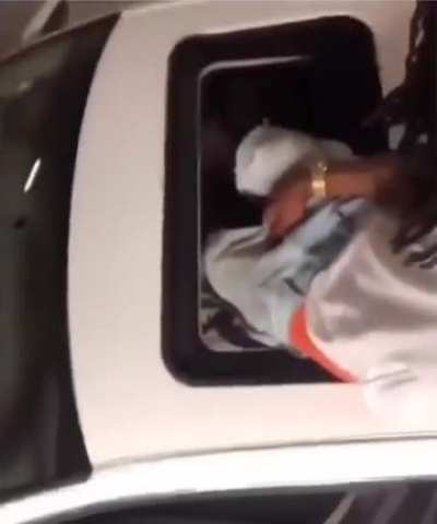 American hits head while driving from the roof