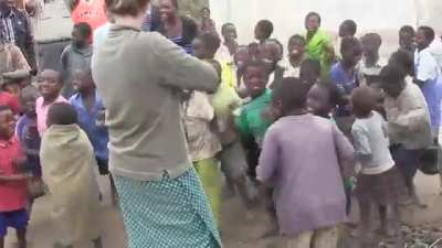 African children hearing the Fiddle for the first time