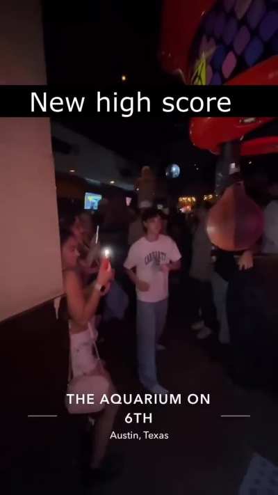 WCGW standing next to punching machine