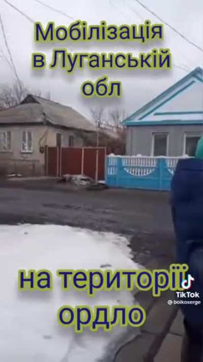 Occupiers in Russian-controlled territory came to draft this woman's son to fight in the war against Ukraine. "He isn't here, he's with his wife," she said. They ask her why she's filming. "It's going up on YouTube and will be used in the Hague Tribunal o