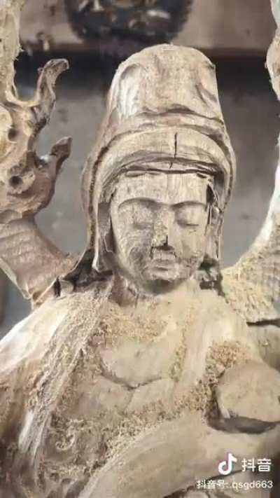 Wooden face carving