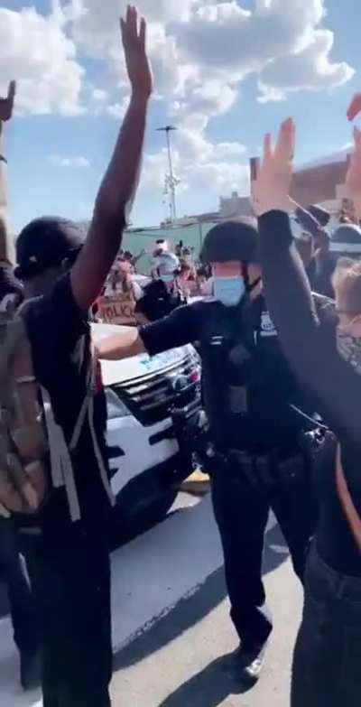 NYPD Cop pulls down peaceful protestor&rsquo;s mask to pepper spray him. This video is being removed all over twitter, they are trying to hide this.