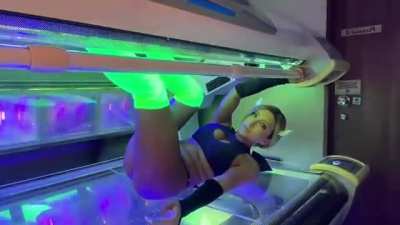 Neon Tanning Booth Demon