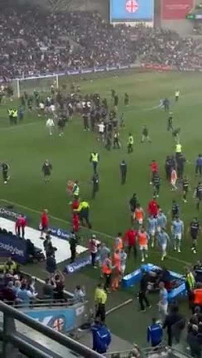 Hooligans invade pitch in Australia, opposition goalie showed real balls and didn&rsquo;t run