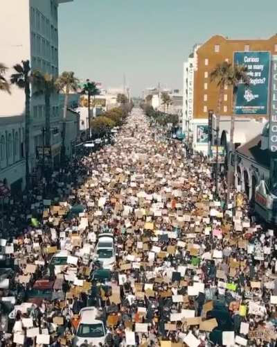 Drone footage over the LA Black Lives Matter protest on Hollywood Blvd today