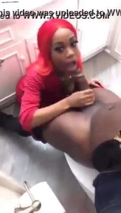 Freak In Red Giving Head