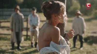 It is tradition for the condemned women to be whipped before they are stripped and raised on the cross in front of the whole town.