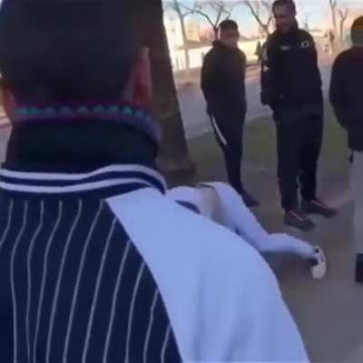 Guy showing off his skills on a trashcan