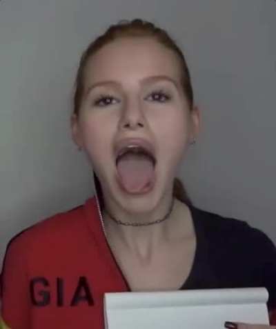 sticking tongue out