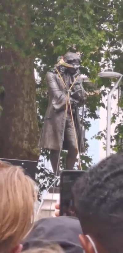 About 10 minutes ago, BLM protestors in Bristol, England tore down a statue of Edward Colston, a very prolific 17th century slave trader
