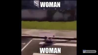 woman driving bad not good hits man