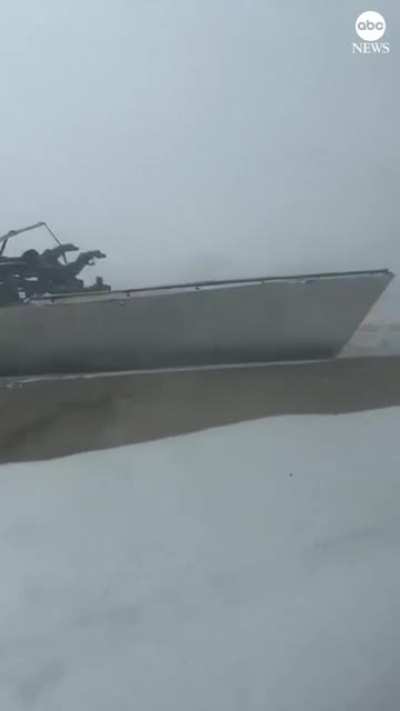 the scene of a deadly pileup on the Ohio Turnpike that involved approximately 50 vehicles during snowy conditions. One person died and multiple people were injured, Ohio Highway Patrol said.