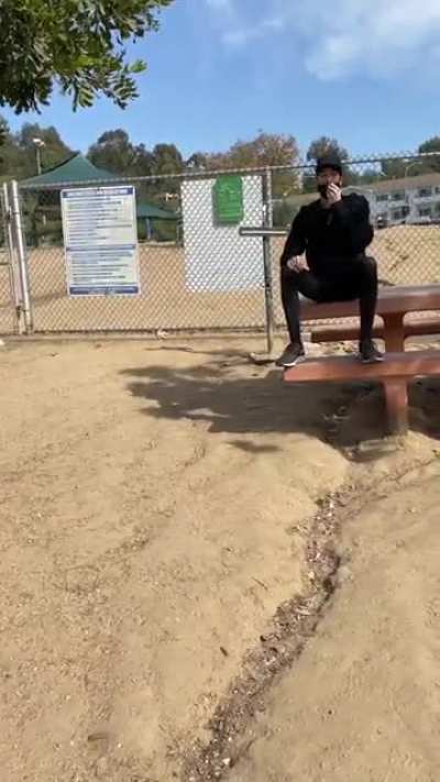 guy having a moment at the dog park