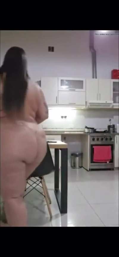 Lucianna cleaning kitchen