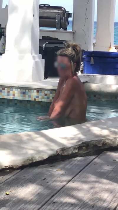 My Exhibitionist wife Kathy in the pool ordering drinks while on vacation in Jamaica. 🇯🇲KATHERINE BROWN🇯🇲