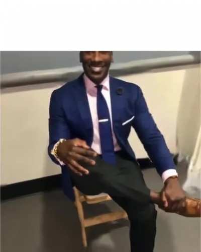 Shannon Sharpe in suits with Vivaldi&rsquo;s Winter in the background