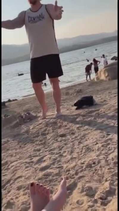 Guy comments on a group of girls at the beach