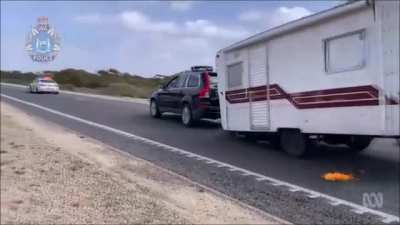 Karen with a caravan runs a covid checkpoint
