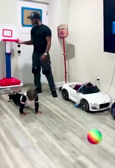 Dad Blocks toddler from shooting a basket and toddler isn&rsquo;t having any of it