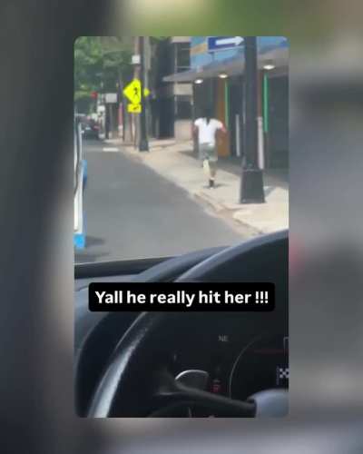 Woman attempting to stop a car from moving gets rolled over