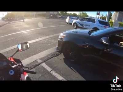 Cop rear ends someone while turning at an intersection