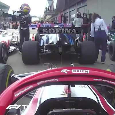 Russell and Alonso hug it out after the race