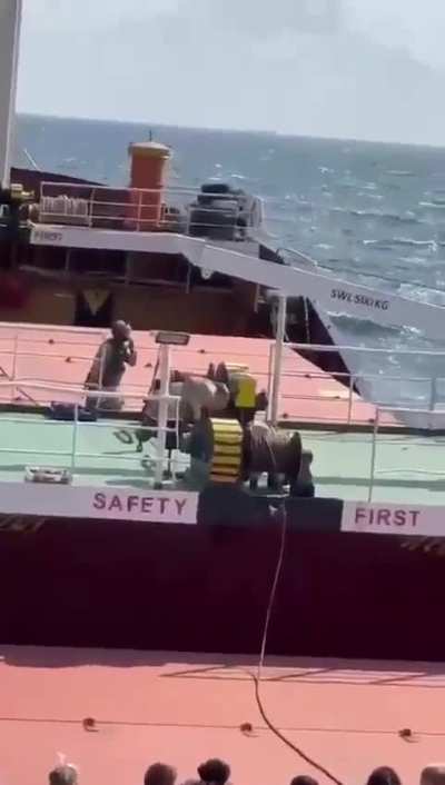 Russian marines boarding a ship.