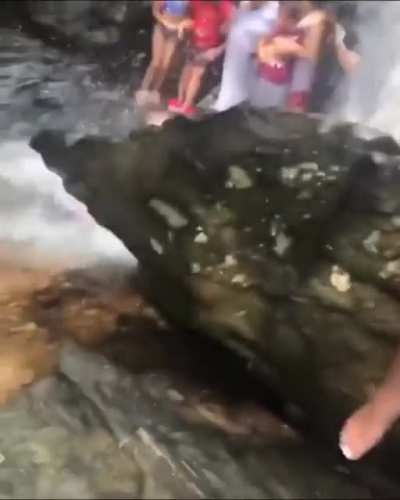 Guy was walking too close to the edge of the waterfall